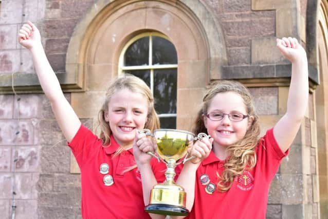 Twin sisters Rowan and Rebecca Morris from Port Ellen won the under-13 duet for Gaelic learners.
