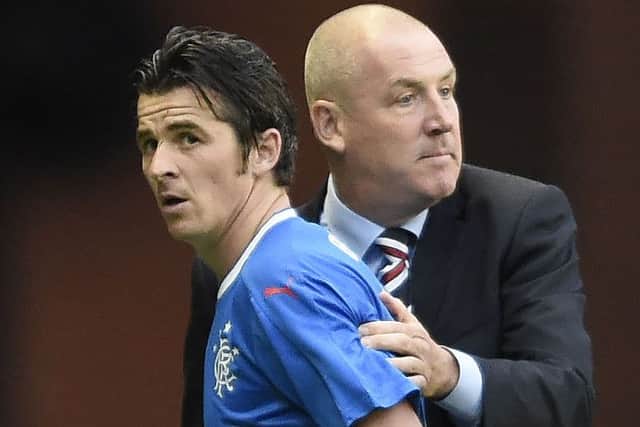 Joey Barton, left, has been absent from the Rangers squad after a bust-up with manager Mark Warburton. Picture: PA