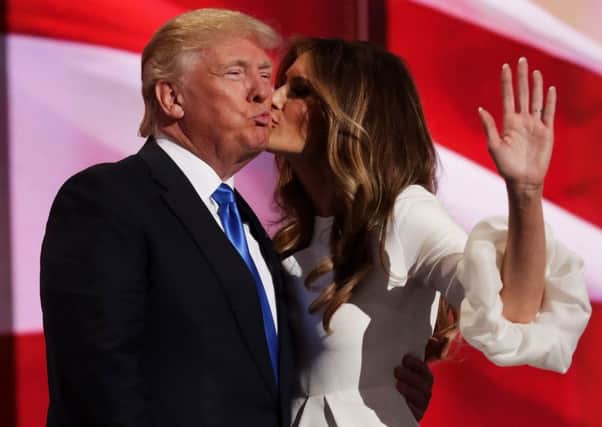 Melania Trump kisses her husband Donald Trump at the Republican National Convention. Picture: Getty Images