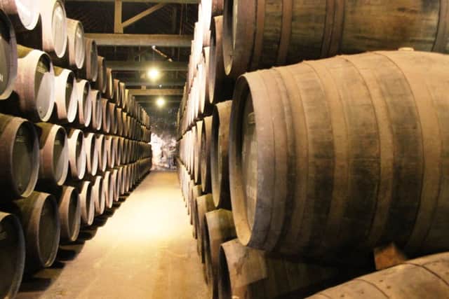 Barrels of port in Graham's cellar image. Picture: Gilly Pickup