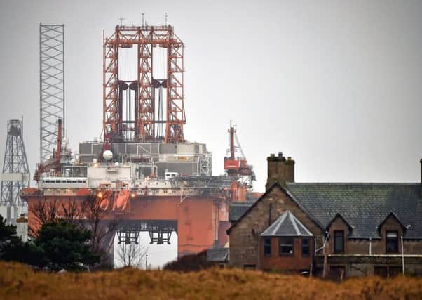 The West Phoenix rig stands amongst others which have been left in the Cromarty Firth  as oil prices continue to decline having a major impact on the UK's North Sea oil industry. Picture Getty Images
