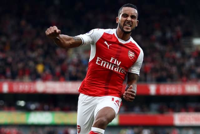 Theo Walcott celebrates scoring against Swansea City. Picture: Getty