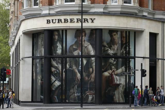 Foreign tourists have cashed in on the falling pound by snapping up Burberry's designs. Picture: Jonathan Brady/PA Wire