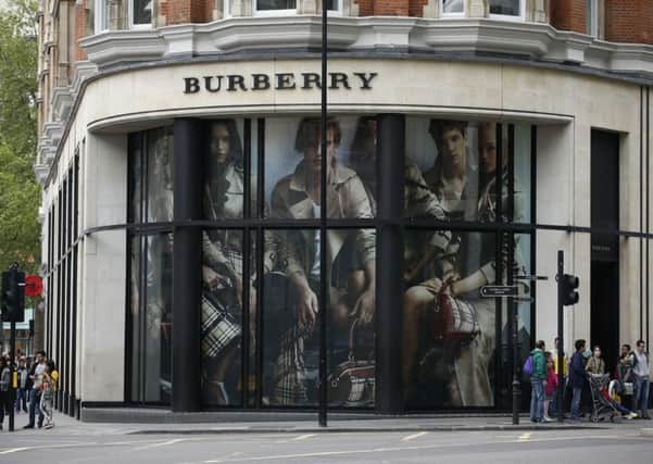 Foreign tourists have cashed in on the falling pound by snapping up Burberry's designs. Picture: Jonathan Brady/PA Wire