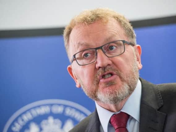 David Mundell said the unemployment figures show "encouraging signs"