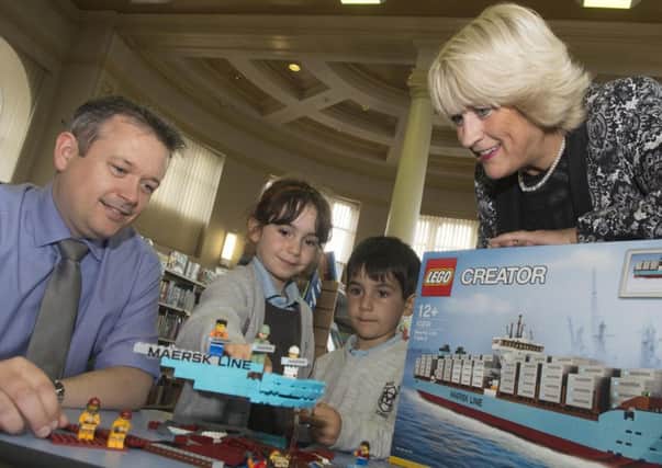 Councillor Angela Taylor and Phil Masson from Maersk along with Noemi Napoletano, 7, and brother , Alex, 6. Picture: Contributed