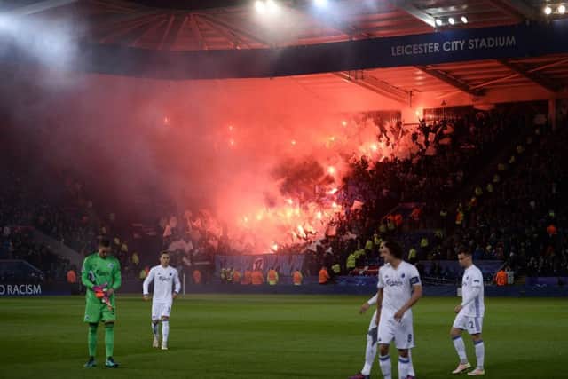 Copenhagen players react as their fans light flares in the King Power stadium. Picture: AFP/Getty