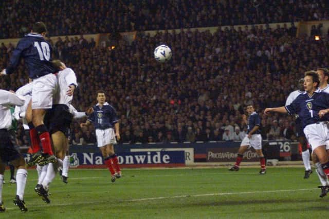 Don Hutchison scores the opening goal for Scotland in the second leg of their Euro 2000 play-off against England at Wembley. Picture: Donald MacLeod.   0-1.