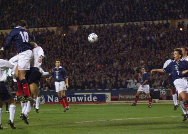 Don Hutchison scores the opening goal for Scotland in the second leg of their Euro 2000 play-off against England at Wembley. Picture: Donald MacLeod.   0-1.