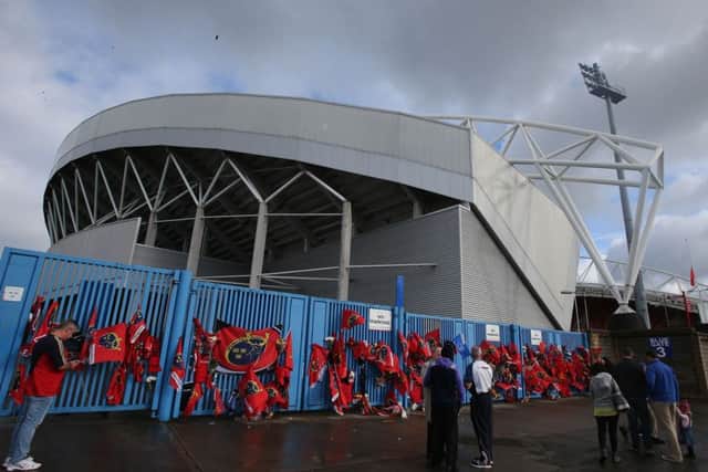 Munster fans pay tribute to former Ireland and Munster star Anthony Foley outside Thomond Park in Limerick. Picture: PA