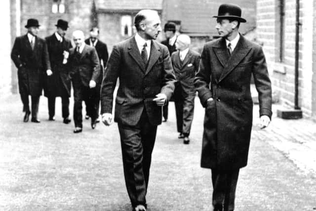 King George VI (right) visiting the Crombie Mill in Yorkshire in  1932 when he was still the Duke of York. . PIC Crombie.