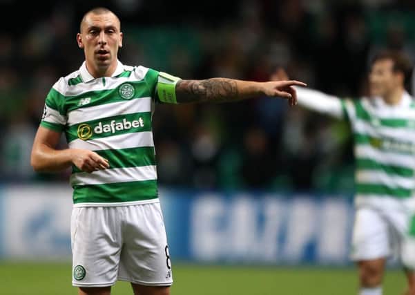 Celtic captain Scott Brown directs his troops during their 2-0 UEFA Champions League Group C defeat to Borussia Monchengladbach. Picture: Andrew Milligan/PA Wire