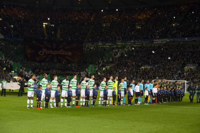 The teams line up before tonights match. Picture: SNS