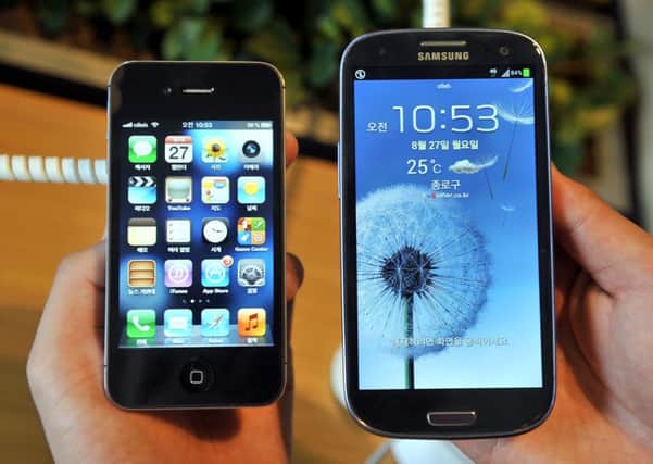 Laird counts smartphone makers Apple and Samsung among its customers. Picture: Jung Yeon-Je/AFP/GettyImages