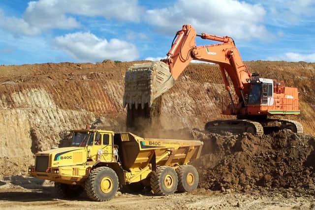 Mining giant BHP Billiton has set itself a target for women to account for half its workforce by 2025, up from the current level of 17%. Picture: STR/AFP/Getty Images