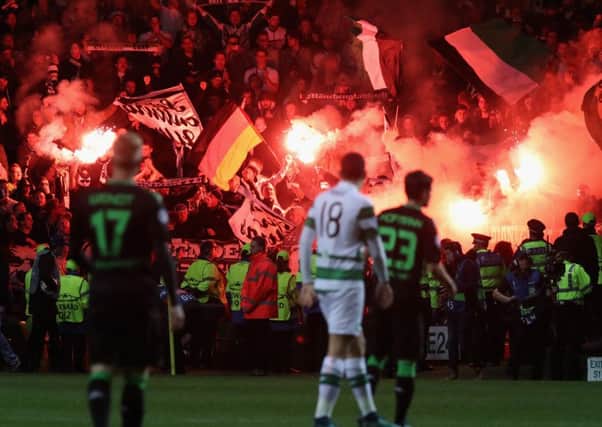 Borussia MÃ¶nchengladbach let off flares during the match. Picture: Getty