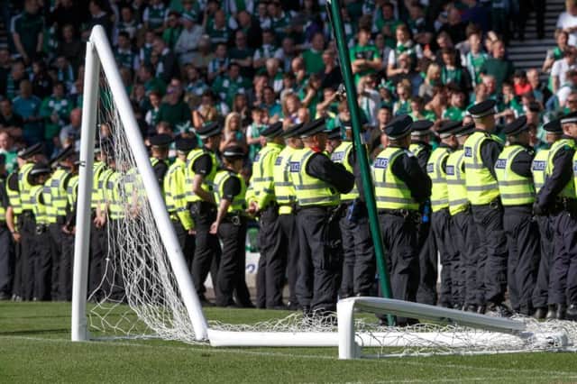 The Scottish Cup final between Hibs and Rangers saw a pitch invasion. Picture: TSPL