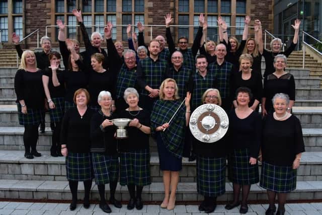 Barra Gaelic Choir celebrate their victory in the Lorn Shield, at the Mod in Stornoway.