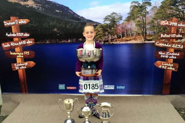 Eilidh with just some of her many trophies. Picture: SWNS