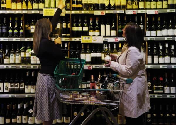 FOR SCOTLAND ON SUNDAY NEWS
WINE TASTES STORY.
Two women wine shopping in a supermarket
PIC TO GO WITH STORY ABOUT HOW SCOTS ARE BAD AT CHOOSING GOOD WINES, AND ARE FOOLED BY CHEAP PRICES , BOTTLE SHAPES AND LABELLING.
PICS TAKEN AT SAFEWAY SUPERMARKET FERRY ROAD , EDINBURGH , WHERE SHOPPERS CAROLINE ELLIS - DARK HAIR , AND LAURA RODGERS - BLOND HAIR , WERE SHOPPING FOR WINES.
PIC PHIL WILKINSON / TSPL STAFF
SCOTSMAN PUBLICATIONS.