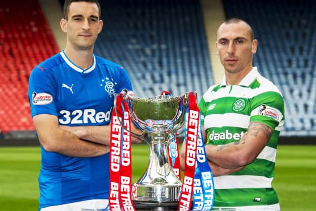 Lee Wallace and Scott Brown will lead their sides out at Hampden this Sunday at 14.15. Picture: SNS