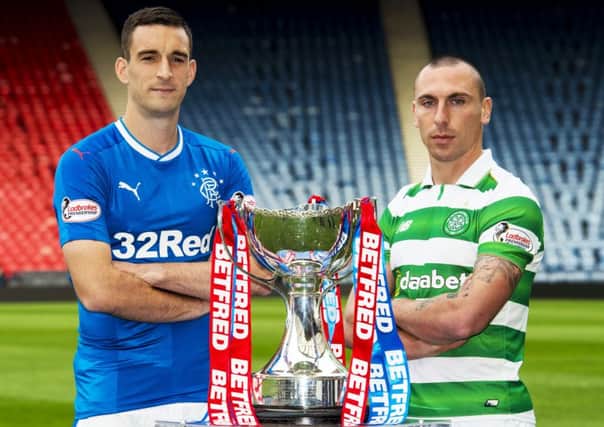 Lee Wallace and Scott Brown will lead their sides out at Hampden this Sunday at 14.15. Picture: SNS