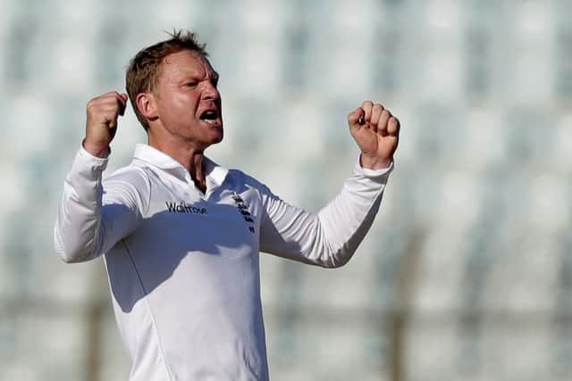 England's Gareth Batty celebrates the dismissal of Bangladesh's Tamim Iqbal during the second day of the first Test. Picture: AM Ahad