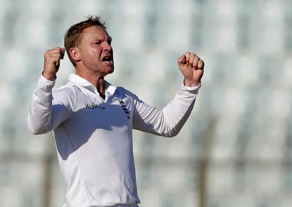 England's Gareth Batty celebrates the dismissal of Bangladesh's Tamim Iqbal during the second day of the first Test. Picture: AM Ahad