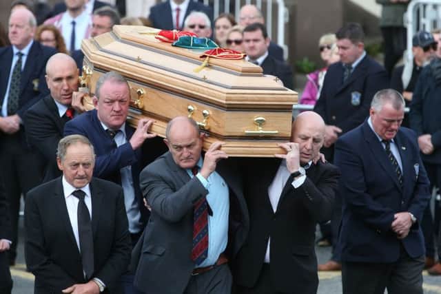 Former Munster players (l to r) John Langford, Mick Galwey, Peter Clohessy and Keith Wood carry Anthony Foleys coffin from St Flannans Church, Killaloe, Co. Clare yesterday. Picture: Brian Lawless/PA Wire