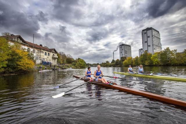 Olympic medalist Polly Swan with team mate Caitie Gorton-Phillips in front of the West Boathouse. Picture: Peter Devlin