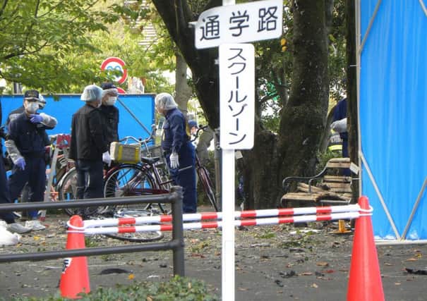 Japanese police investigate the site of an explosion at a park in Utsunomiya. Picture: Getty