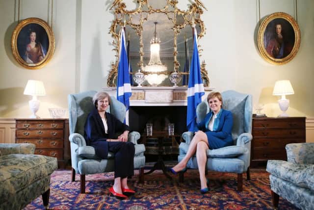 Theresa May and Nicola Sturgeon at a previous meeting. Picture: PA