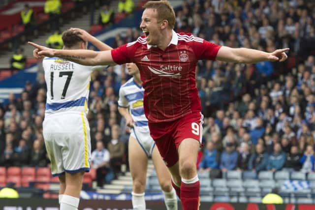 Aberdeen's Adam Rooney celebrates after opening the scoring versus Mortom at Hampden Park. Picture: SNS/Alan harvey