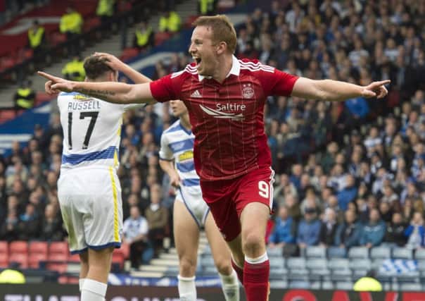 Aberdeen's Adam Rooney celebrates after opening the scoring versus Mortom at Hampden Park. Picture: SNS/Alan harvey
