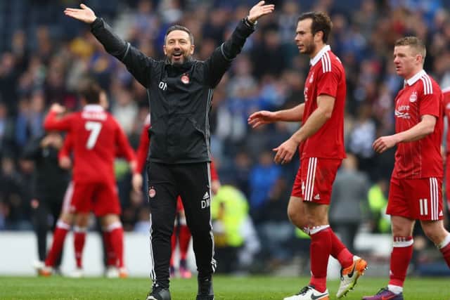 Aberdeen manager Derek McInnes, left, celebrates his side's victory over Morton at Hampden Park. Picture: Getty/Michael Steele