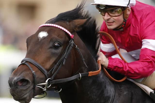 Andrea Atzeni riding Rivet win The Racing Post Trophy at Doncaster. Picture: Alan Crowhurst/Getty