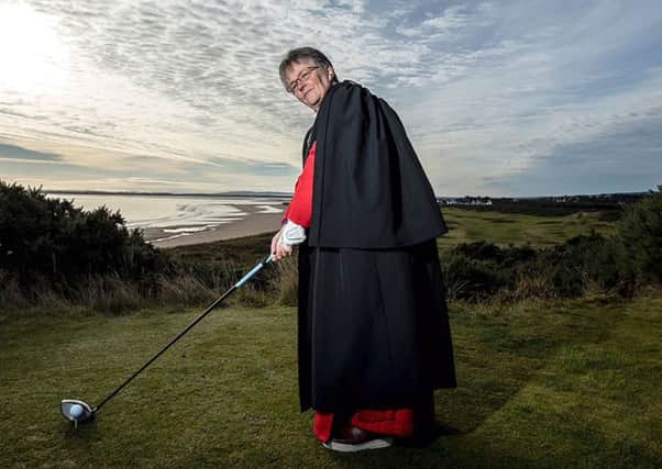 Reverend Susan Brown tees off on the Royal Dornoch Golf course. Picture: Paul Campbell/Church of Scotland/PA Wire