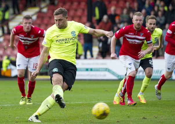Grant Holt put Hibernian ahead from the spot in their victory at East End Parl. Picture: SNS/Garry Williamson