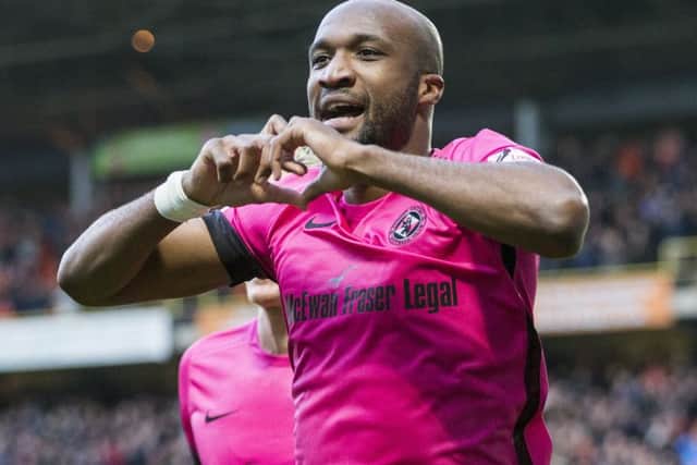 William Edjenguele celebrates his goal. Picture: SNS