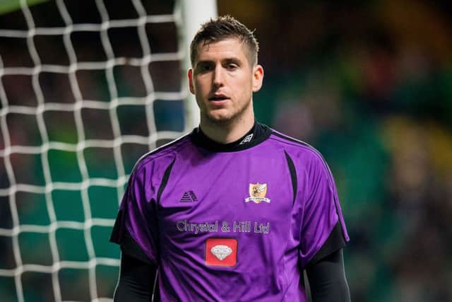 Alloa's Neil Parry in action