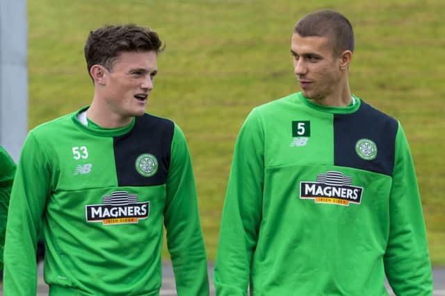 Celtic's Jozo Simunovic, right, is being looked at by a pair of English clubs. Picture: SNS