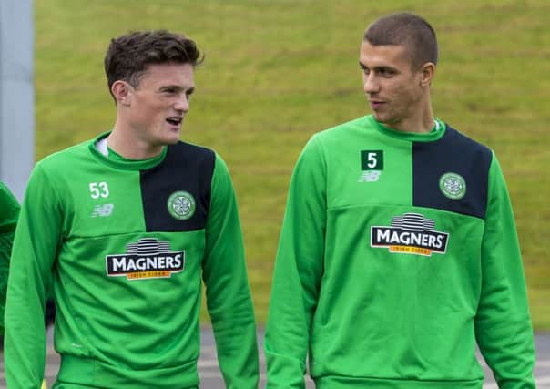 Celtic's Jozo Simunovic, right, is being looked at by a pair of English clubs. Picture: SNS