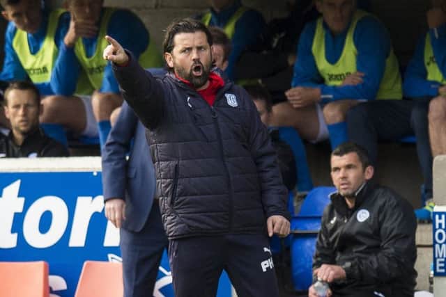 Paul Hartley's Dundee have now lost five games in a row. Picture: SNS