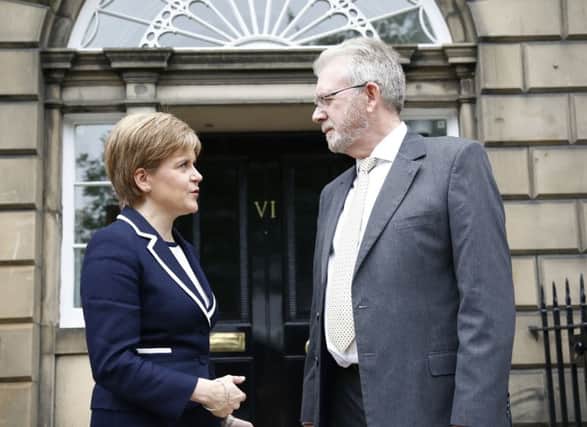 Mike Russell, right, says UK Government have to understand Scotland's triple mandate. Picture: PA