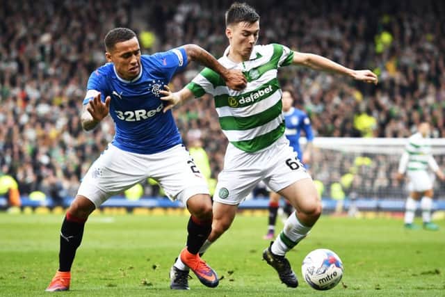Rangers' James Tavernier (L) and Celtic's Kieran Tierney battle for possession. Picture: SNS