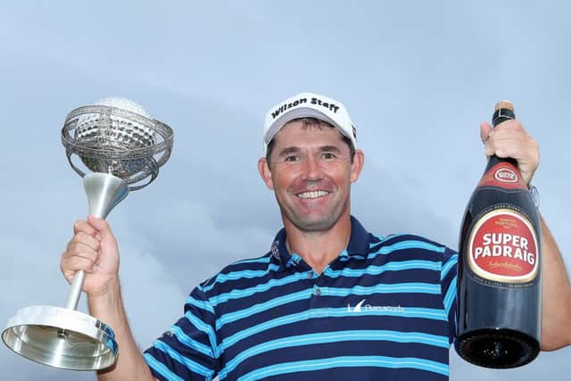 Padraig Harrington with the trophy and a bottle of beer following his victory at the Portugal Masters. Picture: Getty.