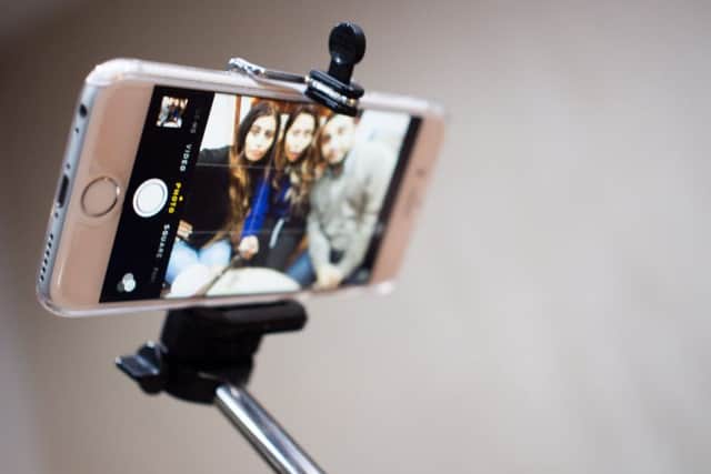 Selfie sticks, tablecloths and CD storage racks have fallen out of fashion, according to a report into a year in the life of the British shopper. Picture: Wikimedia