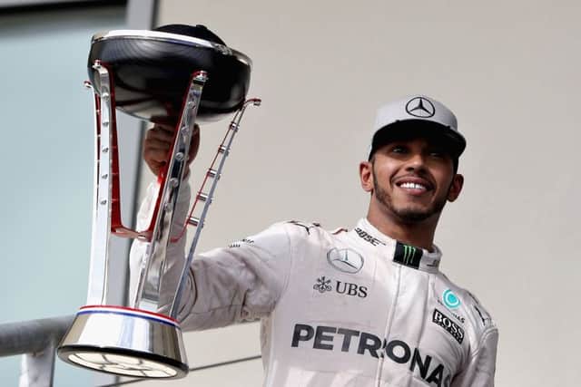 Lewis Hamilton celebrates his win in the United States Grand Prix. Picture: Mark Thompson/Getty Images