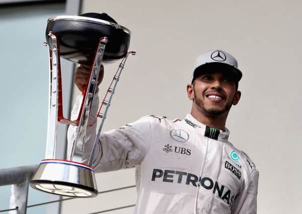 Lewis Hamilton celebrates his win in the United States Grand Prix. Picture:  Mark Thompson/Getty Images