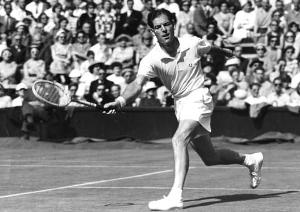 Tony Mottram in action against America's H W Stewart on the centre court at Wimbledon. Picture: Topical Press Agency/Getty Images